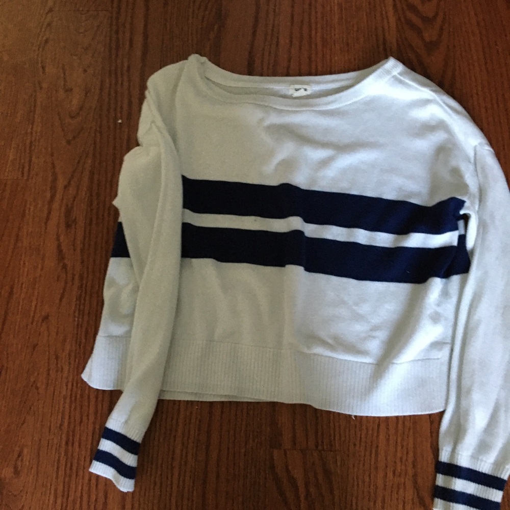 White sweater with blue stripes
